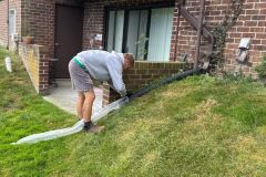 Roof cleaning crew performing safety checks before starting the commercial job