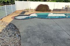 Before and after concrete power washing.