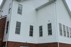 house washing removed buildup and stains for a brighter, cleaner exterior.