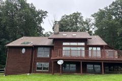 years of black streaks and grime safely cleaned from this Carroll County home's roof