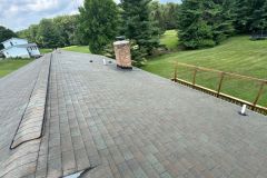 from dark, stained shingles to a bright, clean roof that boosts curb appeal.